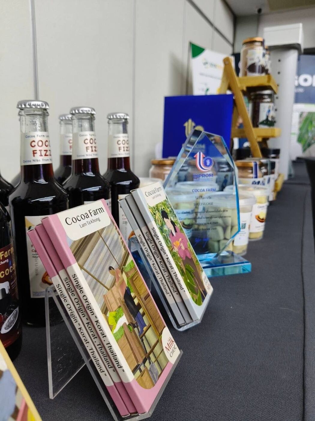 The farm's chocolate bars, COCOA FIZZ drinks and an award trophy